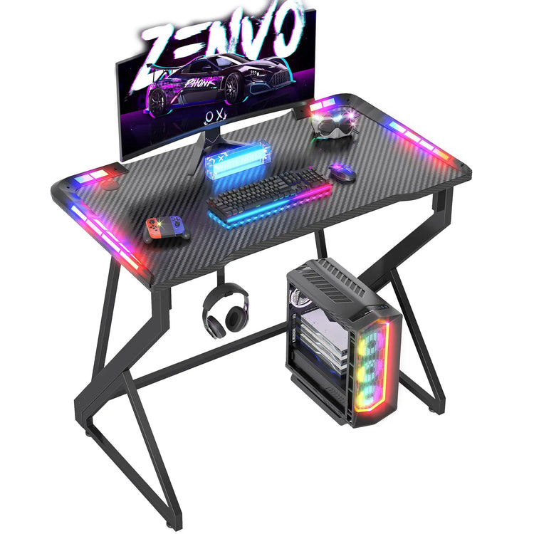 BEXEVUE Gaming Desk with LED Armor, 100x50 cm RGB Computer Desk with Carbon Fiber and Z Frame Design Gaming PC Desk with Head Phone Hook for E-sport Gamer Table, Easy Assemble Home Office desk, Black